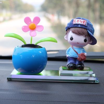 汽车香水摆件车内饰品可爱摇头太阳花呆萌公仔创意卡通车载装饰品