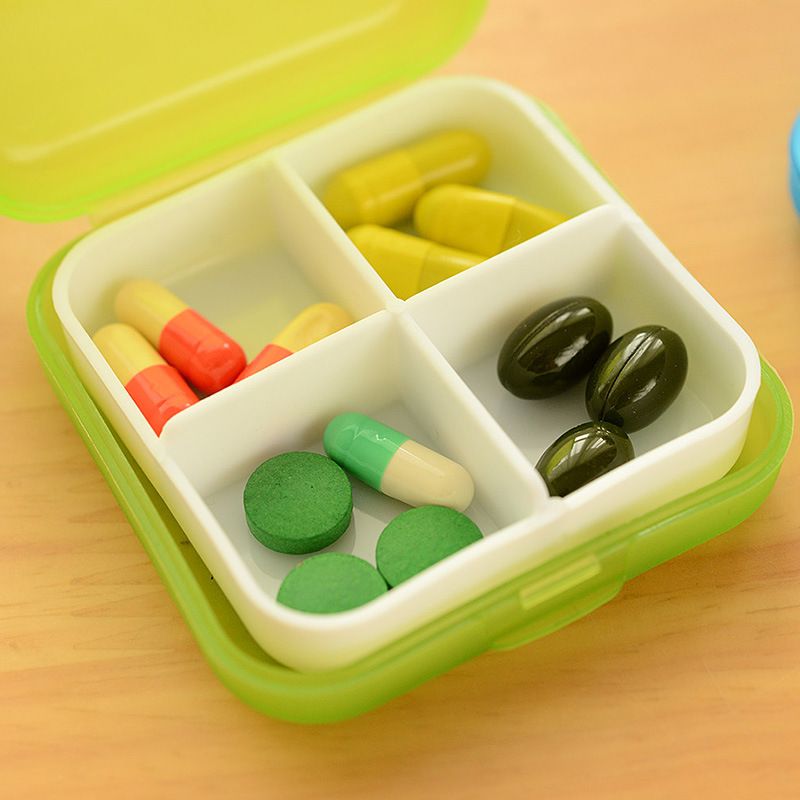 Portable mini four compartment portable medicine box storage box