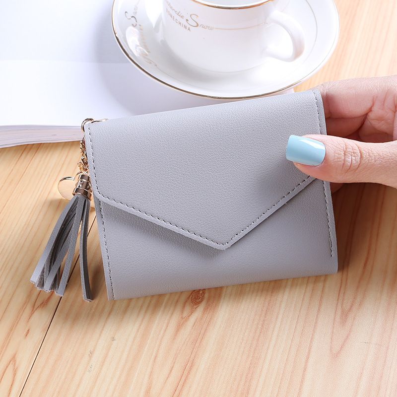 New tassel pendant women's wallet short fashion zero wallet Korean student cute zipper card bag coin bag