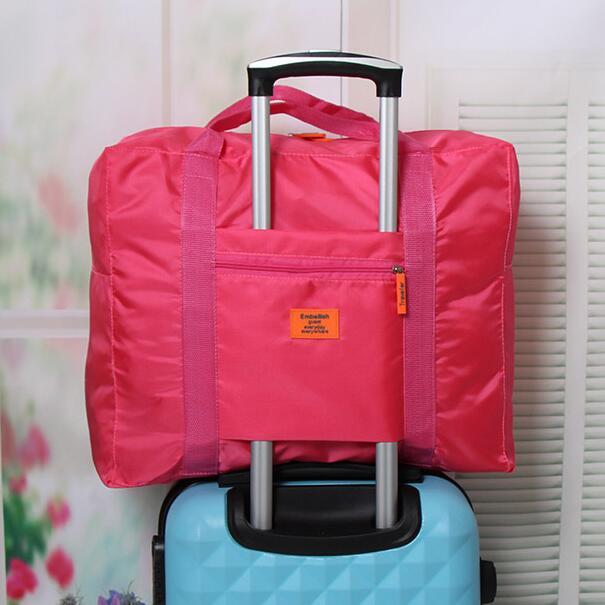 Korean waterproof nylon folding travel storage bag trolley case storage bag for men and women