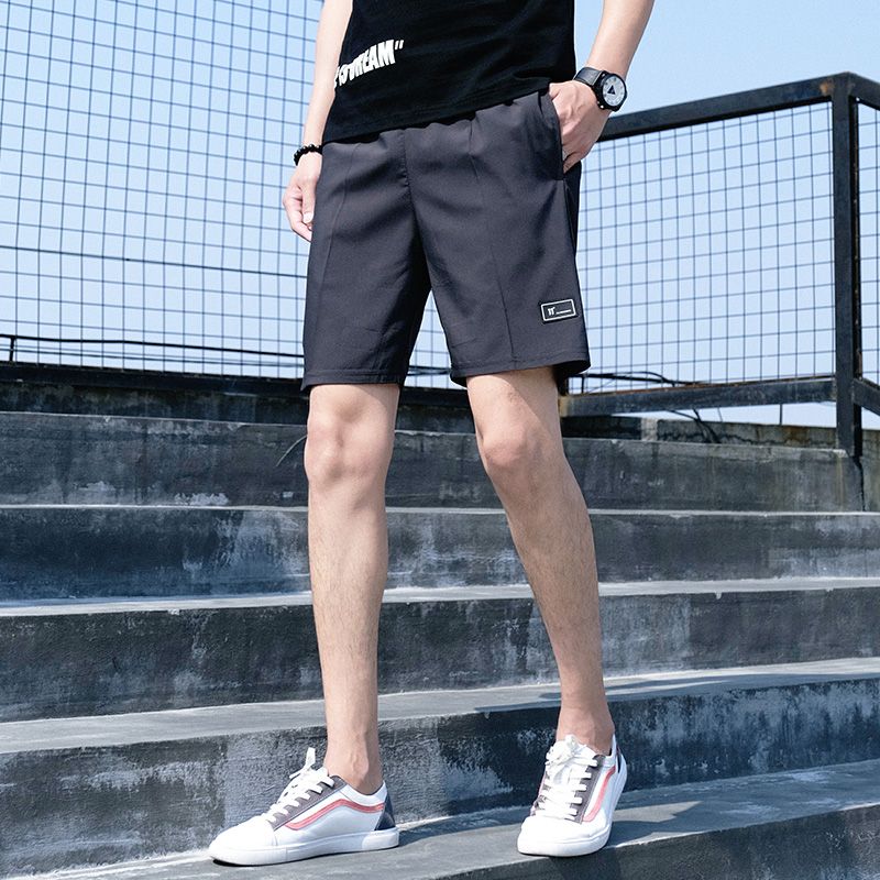 Summer men's sports shorts are trendy and loose, big size five point pants, beach pants, thin breathable quick drying pants