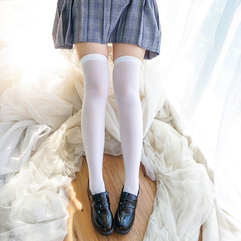 白长筒袜可爱短裙图片