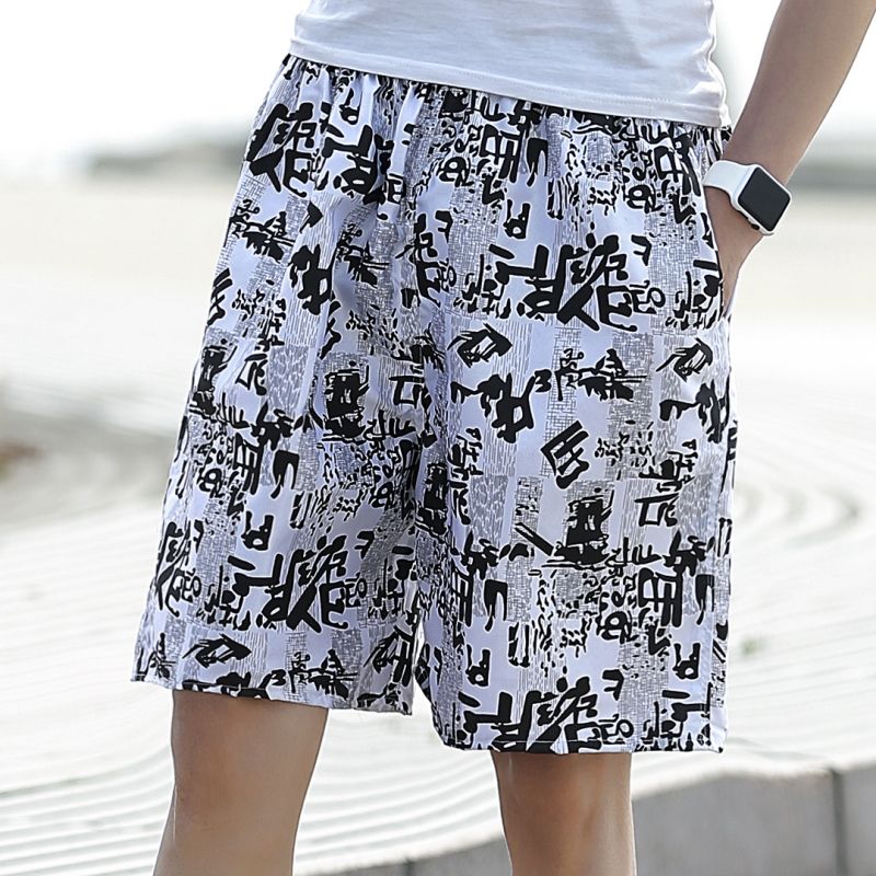 Summer loose quick drying pajamas men's beach pants sports 5-point flower shorts casual 7-point large pants swimming trunks men