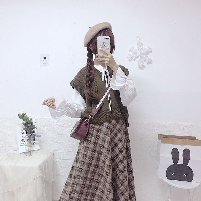 慵懒风毛衣马甲外穿 620e488d-c98d-4941-bc53-c434e615320b.jpg