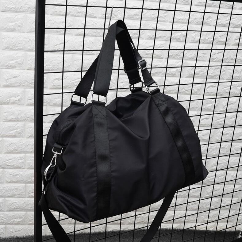 Simple travel bag women's hand luggage bag large capacity waterproof foldable short distance travel bag men's leisure fitness bag