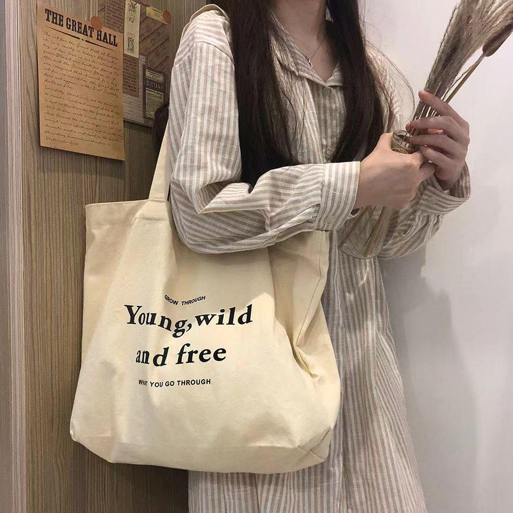 Bag women's new ins Korean version one shoulder girl student fashion versatile solid color canvas large capacity shopping bag