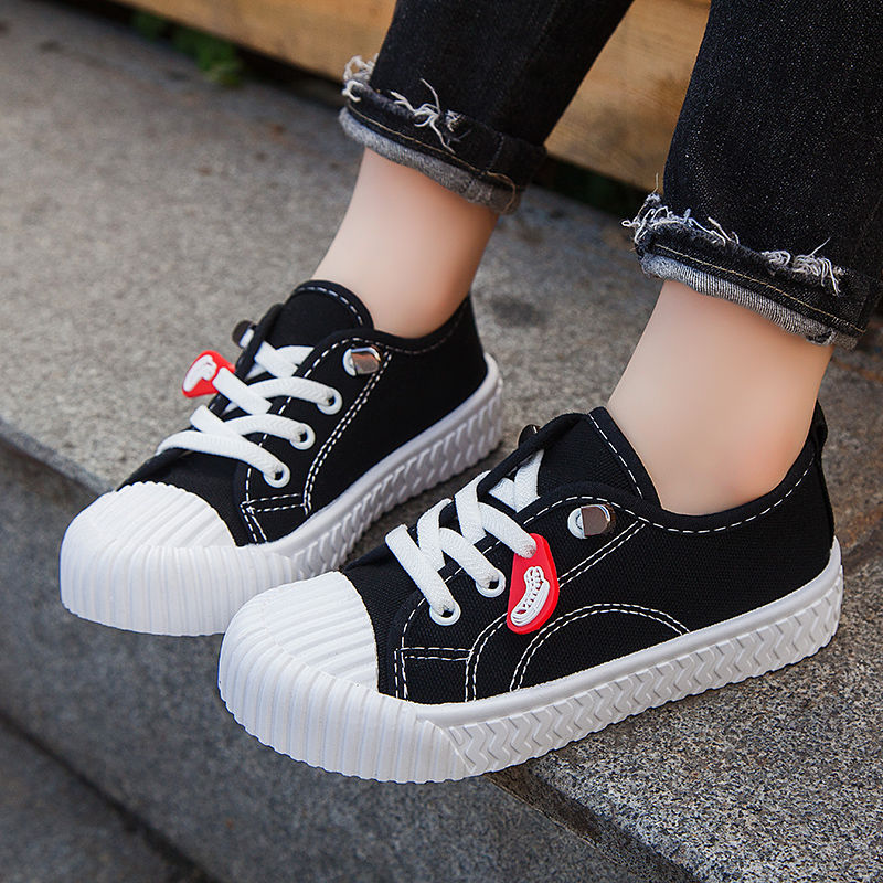 Spring and autumn 2020 small white small black shoes fashion versatile primary and secondary school children's running shoes children's casual canvas shoes