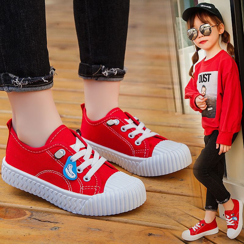 Spring and autumn 2020 small white small black shoes fashion versatile primary and secondary school children's running shoes children's casual canvas shoes