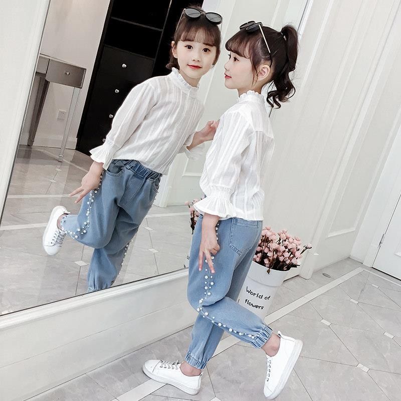 Girls' jeans spring 2020 Korean version of foreign style little girls' net red pants middle and large children's fashionable pearl casual pants