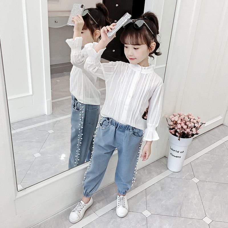 Girls' jeans spring 2020 Korean version of foreign style little girls' net red pants middle and large children's fashionable pearl casual pants