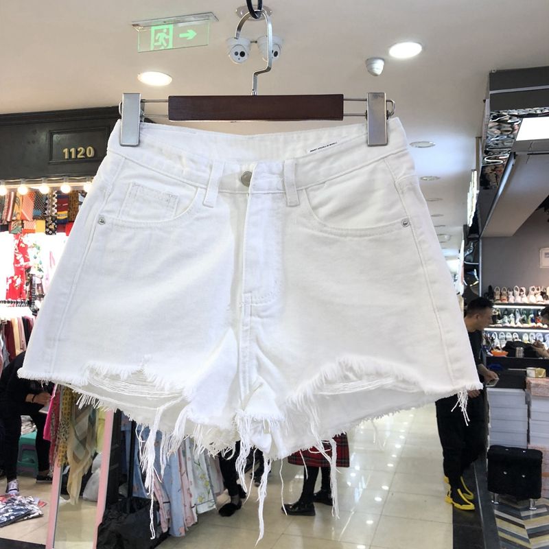 Spring and summer new look thin pierced denim shorts women's high waist rough edge irregular wide leg white short pants