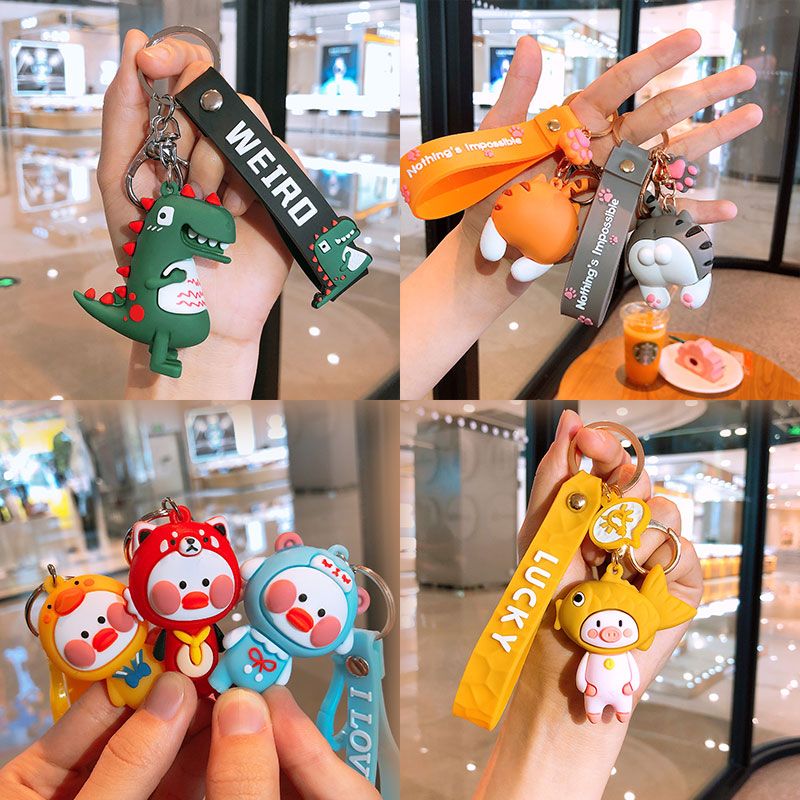 Creative small dinosaur Keychain Keychain Keychain cute cartoon female car key chain men and women bag hanging gifts