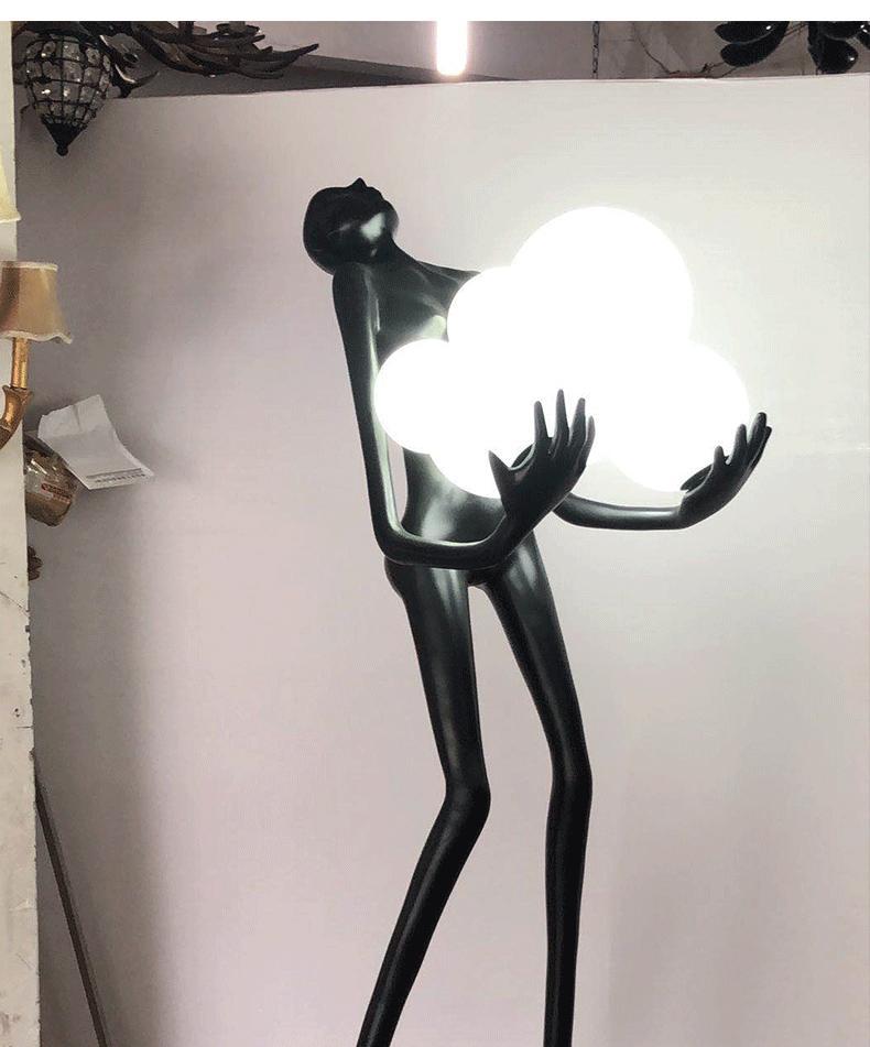 人形艺术雕塑抱球落地灯设计师酒店大堂展厅创意大型人体落地灯