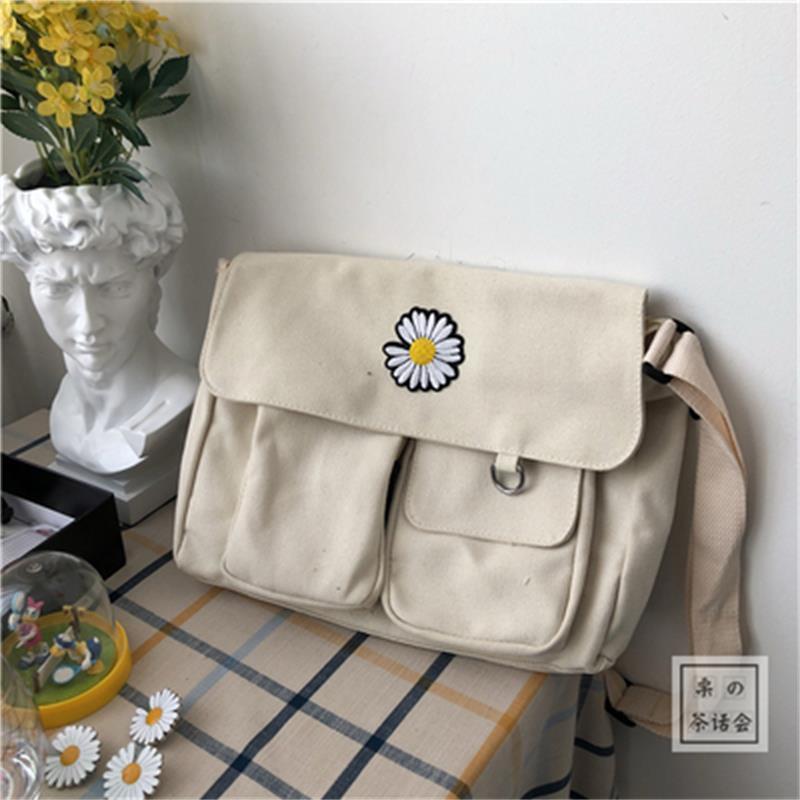 Tea party Japanese versatile crossbody bag Korean ins literary workwear Hong Kong style canvas bag men and women Harajuku messenger bag