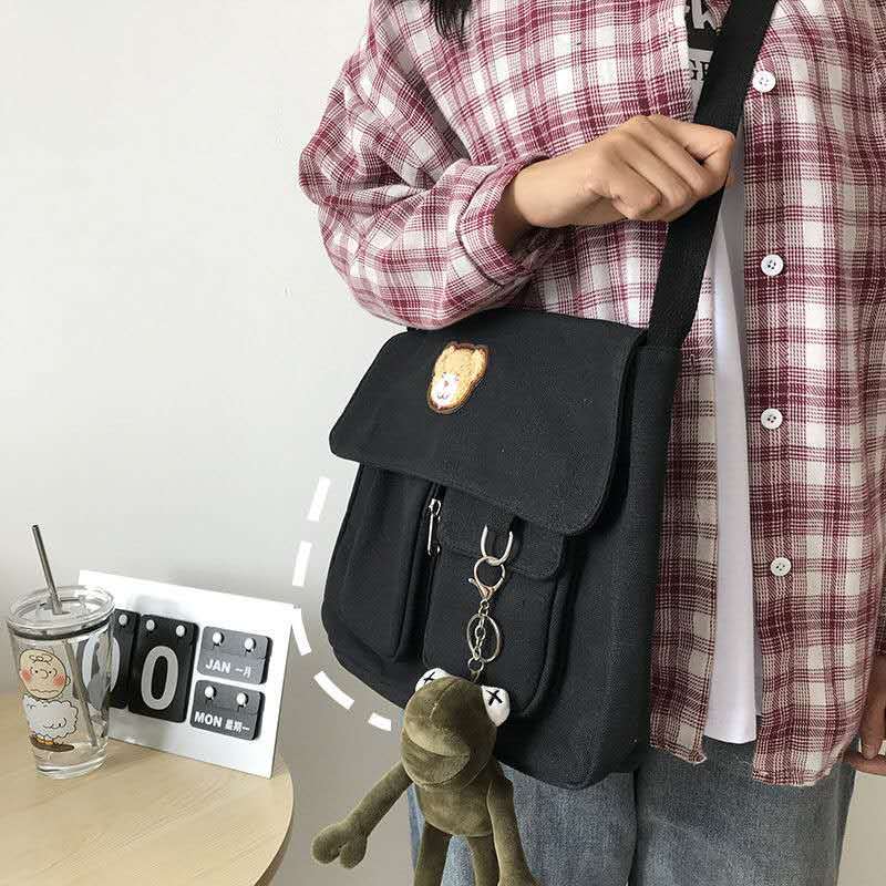 Tea party Japanese versatile crossbody bag Korean ins literary workwear Hong Kong style canvas bag men and women Harajuku messenger bag