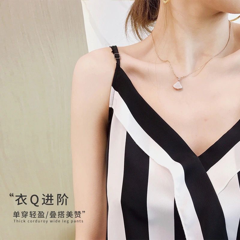  new striped suit with female ruffled camisole and loose sleeveless top V-neck shirt