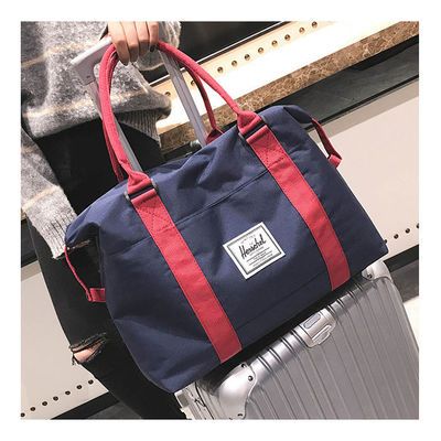 旅行出差帆布手提包大容量男士行李袋健身便携短途套拉杆女登机包