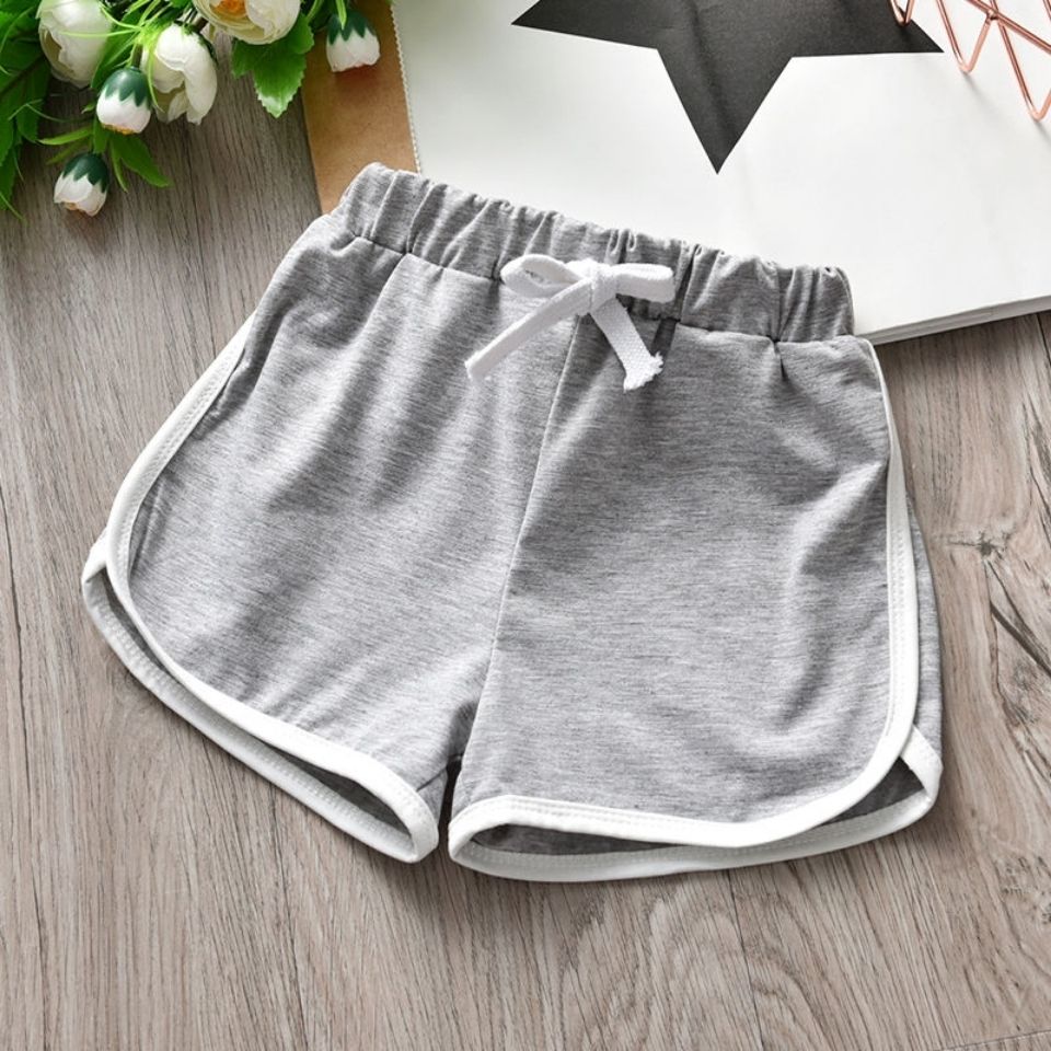 Summer children's clothing Korean version pure color girls' summer hot pants versatile women's treasure cotton shorts boys' comfortable Sports Shorts Girls