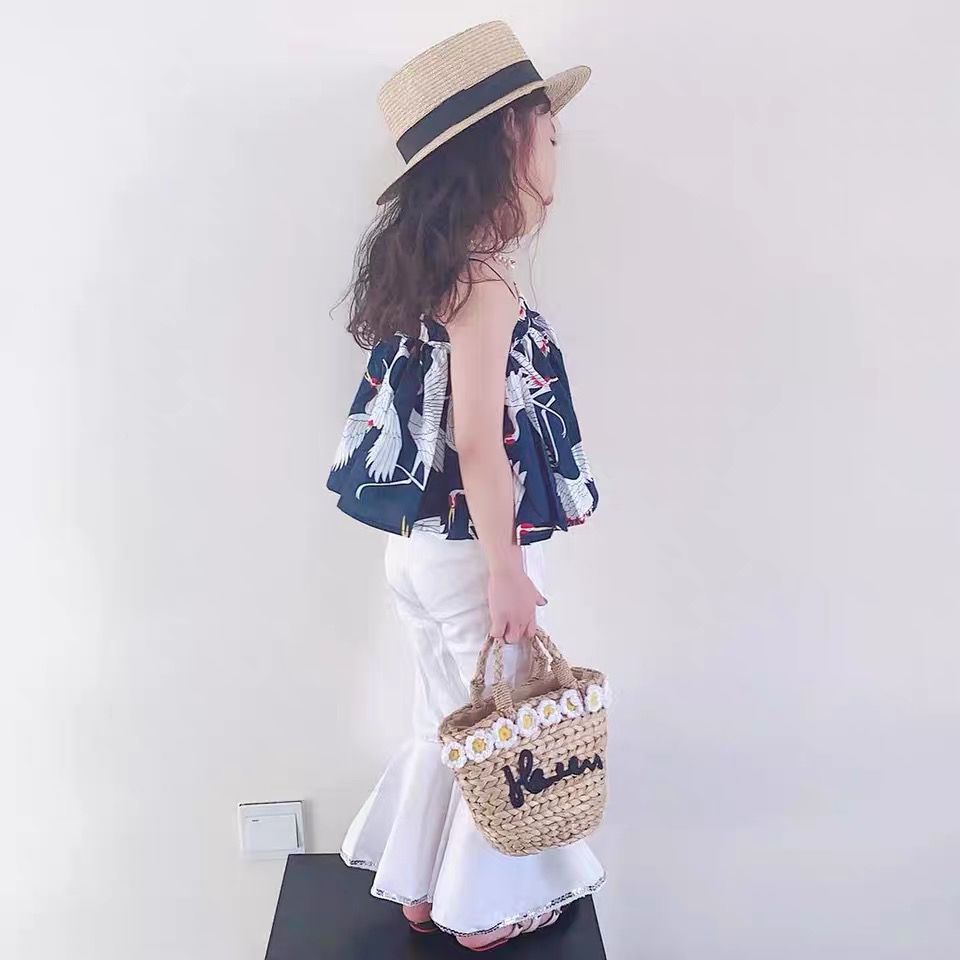 Flickset med off shoulder bandeau topp och vida byxor_voghion.com