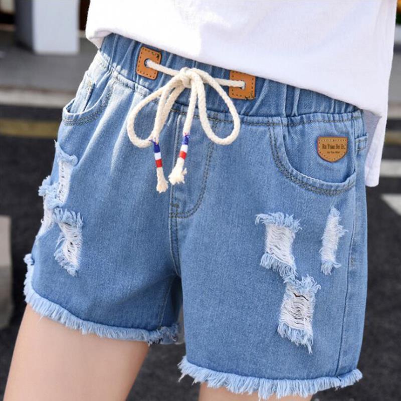 Denim shorts female summer high waist student elastic waist hole Korean hot pants raw lace curling loose wide leg pants