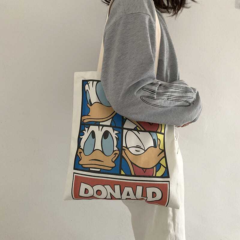 Donald Duck canvas bag women's one shoulder Japanese Harajuku ulzzang cartoon zipper student's hand-held bag shopping bag