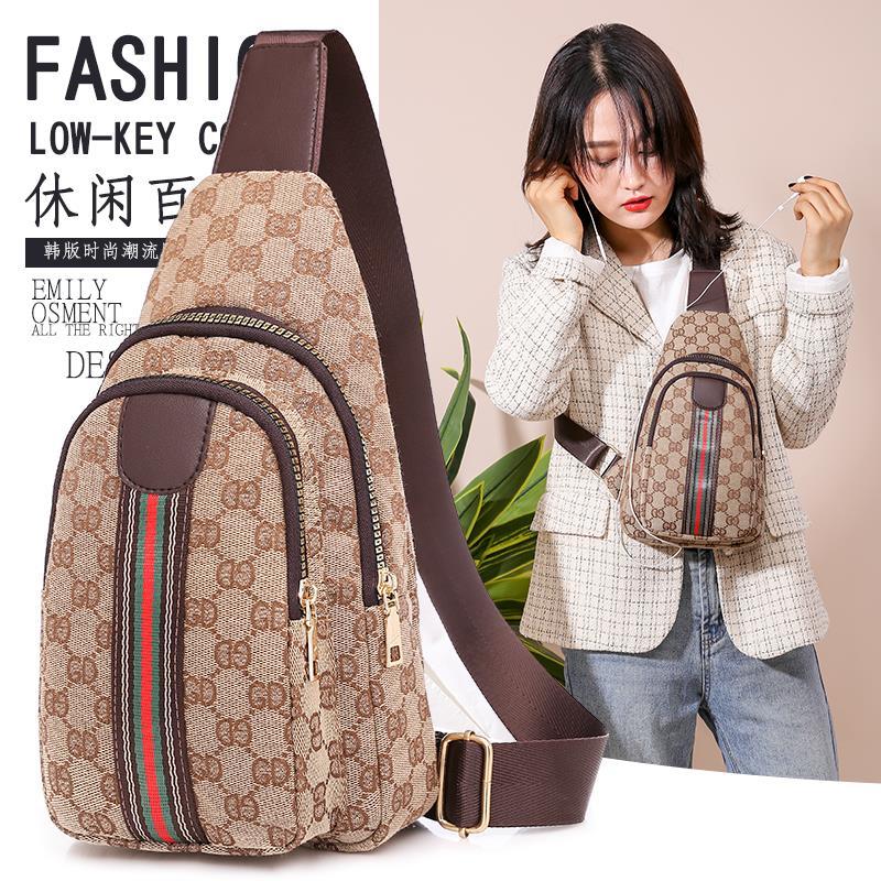 女士條紋胸包2020新款時尚帆布斜跨百搭胸前包休閒前挎包包潮