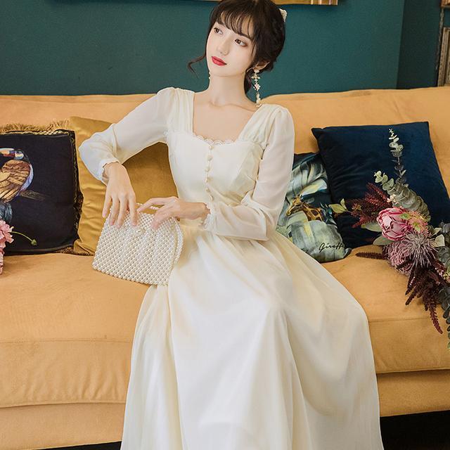 白色连衣裙2022新款秋季收腰显瘦大摆仙女裙长款超仙温柔风长裙女