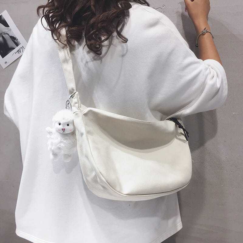 大容量帆布包包女2020新款日系餃子包學生百搭上課單肩斜挎書包潮